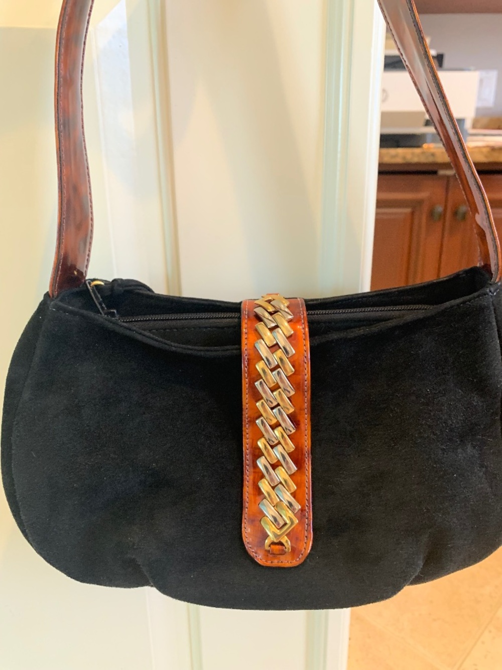 Black, suede hand bag.